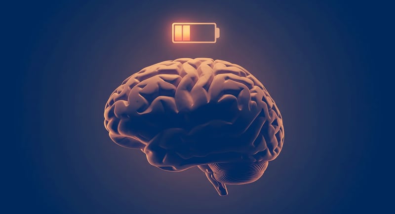 A glowing illustration of a human brain